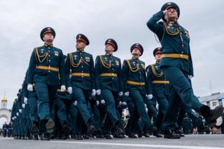 in_pictures Servicemen march during a Victory Day military parade