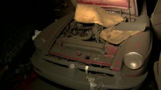 The garage of classic cars has been destroyed