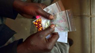 TB drugs for man hand