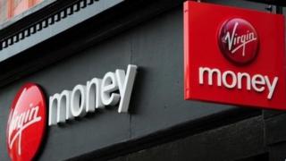 Close up of Virgin Money logos on branch
