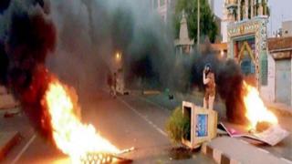 Police say farmers clashed with them and set several vehicles on fire