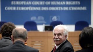 Turkish politician Dogu Perincek from the left-wing Turkish Workers" Party looks on at the European Court of Human Rights in the eastern French city of Strasbourg