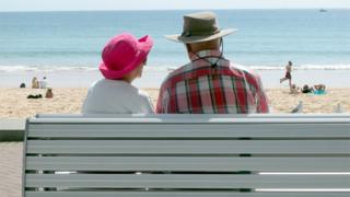 Pensioners on beach