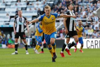 James Ward-Prowse celebrates his injury-time equaliser from the penalty spot at Newcastle