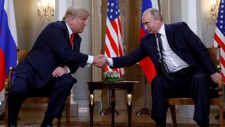   US President Donald Trump and Russian President Vladimir Putin shake hands at their meeting in Helsinki, Finland, July 16, 2018 