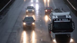 cars navigate rain on 30 September