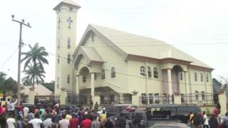 People gathered in front of the church attacked