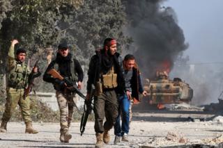 Turkish-backed Syrian opposition fighters take position in al-Bab, 22 February