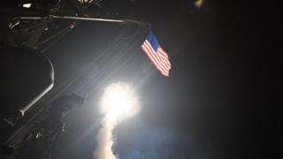 Tomahawk missile being fired from USS Porter