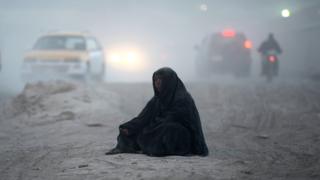 Woman begging