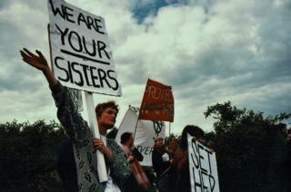 Protesters hold placards outside Yarl's Wood