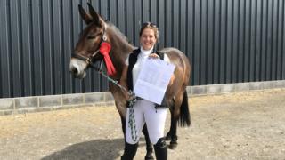 Christie Mclean and Wallace with his rosette