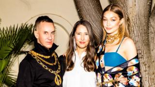 Moschino's creative director Jeremy Scott with Ann-Sofie Johansson, creative advisor of H&M and Gigi Hadid