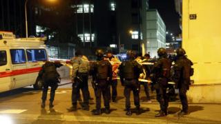 Police stand outside an Islamic centre in central Zurich, Switzerland
