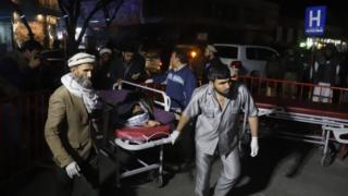 An injured person is taken to hospital in Kabul