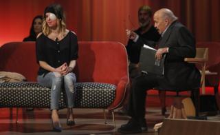 Gessica Notaro, appearing with Maurizio Costanzo (R)