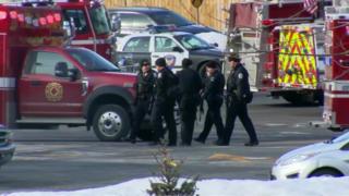 Police officers at the scene in Aurora, Illinois