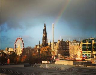 Rainbow above Scott Monument and Edinburgh Christmas markets