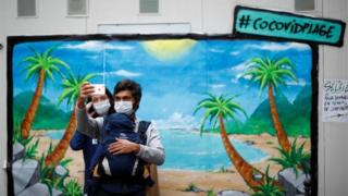 couple take selfie in Paris