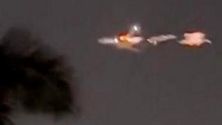 Footage of plane spluttering flames