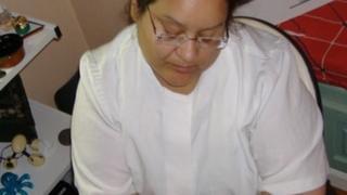 Maribel Milligan working as a masseuse