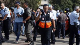 Israeli emergency services personnel at the scene of a stabbing attack in Jerusalem's Ammunition Hill district (12 October 2015)