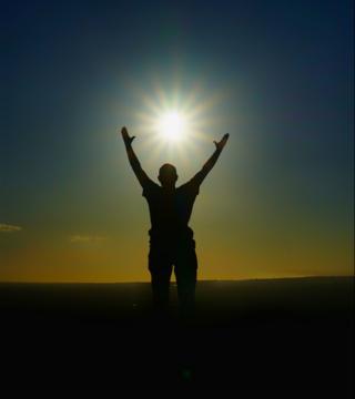 A man's silhouette in the sun