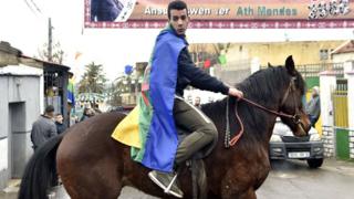 Algerian Berbers celebrate the Yennayer New Year in Ath Mendes, south of Tizi-Ouzou, east of the capital Algiers, on January 12, 2018. The Berbers - an ethnic group descended from the pre-Arab populations across North Africa - are currently celebrating their New Year festivities. Today - for the first time - the Yennayer New Year is being marked as a national holiday in Algeria