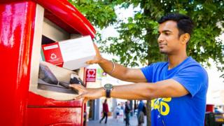Man using parcel postbox