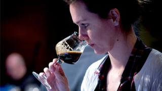 Brazilian beer sommelier Fernanda Meybom samples a beer at the Copa Cervezas de América
