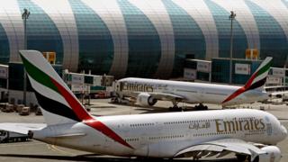 In this May 8, 2014 file photo, Emirates passenger planes are in use at Dubai airport in United Arab Emirates.
