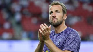 Harry Kane applauds fans after Tottenham's friendly with Lion City Sailors