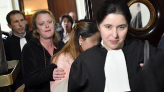 One of the alleged victims (2ndR) arrives to attend the trial of the UAE princesses at the Brussels criminal court for human trafficking on 11 May 2017