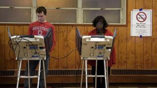 US voters using electronic voting machines