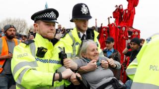 Woman being arrested