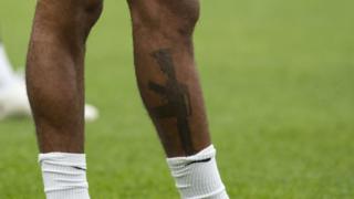 Sterling's tattoo was pictured during training in Burton-on-Trent on Bank Holiday Monday