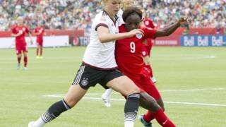 England's Eniola Aluko and Germany's Melanie Leupolz at the Women's World Cup 2015