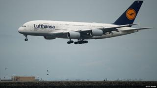 A Lufthansa plane lands at San Francisco International Airport