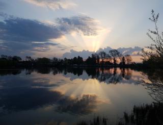Reflection of a sunset over a lake