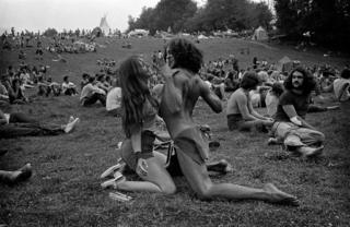 Dancing couple, featured on the cover of Newsweek magazine, Woodstock Festival, Bethel, New York, 1969