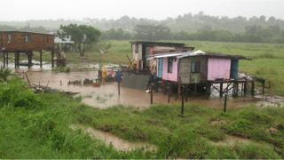 houses-on-stilts-in-floodwaters
