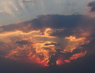 Sunset through clouds