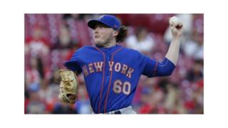 Conlon throws a pitch
