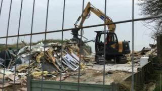 Remains of demolished chalet