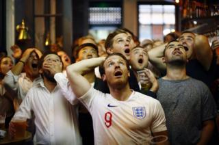 England football fans watch England play