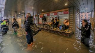 Tourists wait for reopening of Vaporetto service October 29, 2018