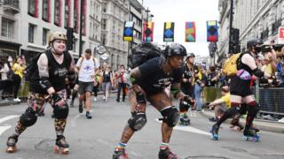 Roller skaters in London Pride