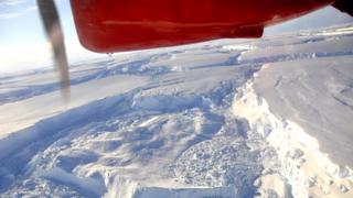 View across Antarctica with part of plane in view