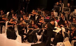 The National Symphony Orchestra Of Myanmar, during a performance
