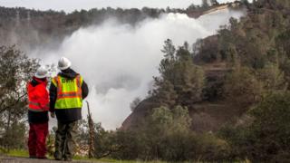 A team from the Department of Water Resource, monitors the section of damaged main spillway at Oroville dam in Oroville, California, USA, 13 February 2017